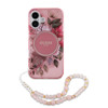 Imagen de FUNDA GUESS IPHONE 16 MAGSAFE STRIPE PINK FLOWERS 8852